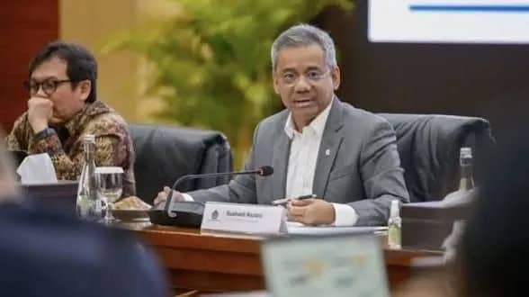 Ilustrasi berita Pemerintahan: Gaji PNS Tetap Lewat Bank, Usulan Kopdes Merah Putih Belum Berlaku