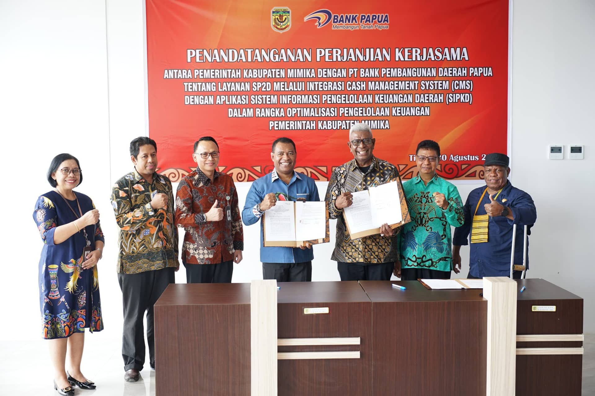Ilustrasi berita Mimika: Atasi Kesulitan Penginputan, Pemda Mimika Tandatangani MoU Dengan Bank Papua Tentang Layanan SP2D Melalui Integrasi CMS