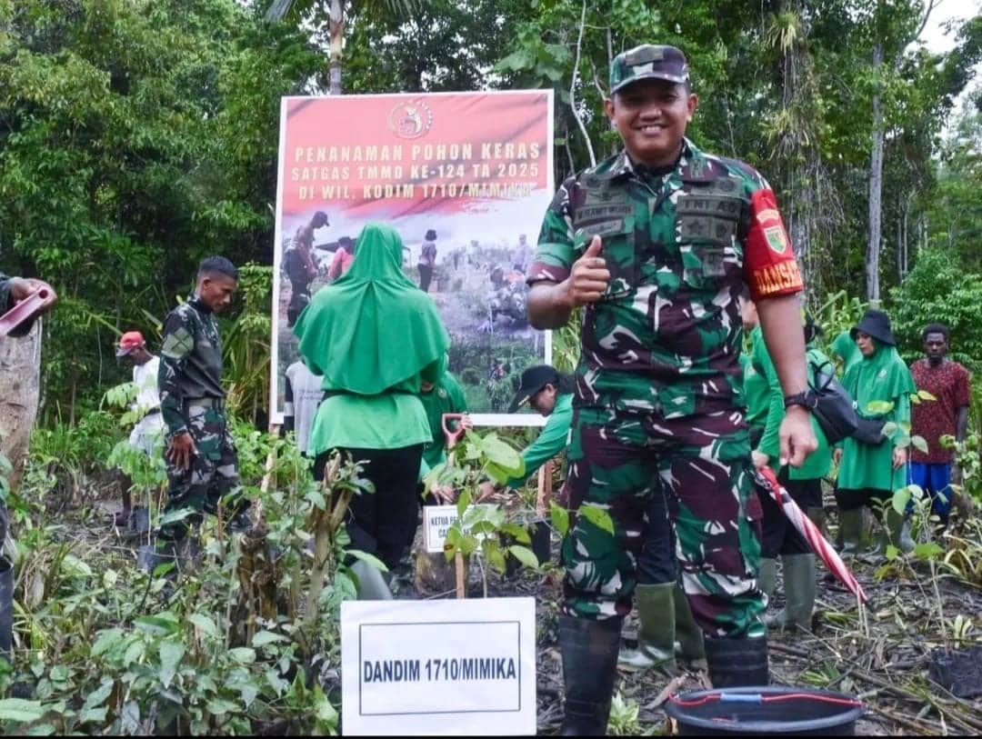 Ilustrasi berita Mimika: Sasaran Fisik TMMD ke-124 Capai 85 Persen, Dandim Mimika Pimpin Aksi Hijau Tanam 500 Bibit Pohon di Pigapu