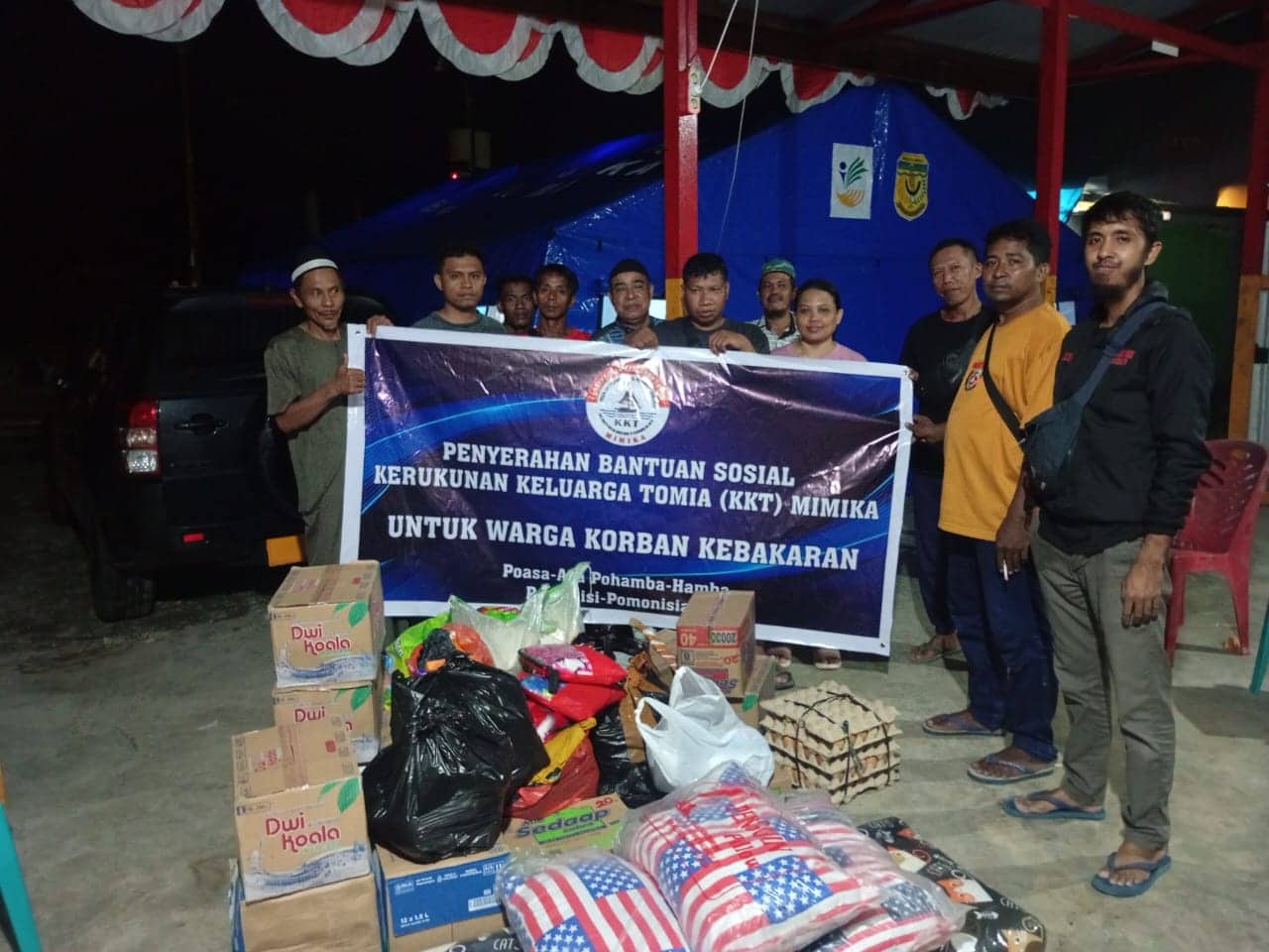 Ilustrasi berita Mimika: Kerukunan Keluarga Tomia Mimika Salurkan Bantuan untuk Korban Kebakaran di Pomako