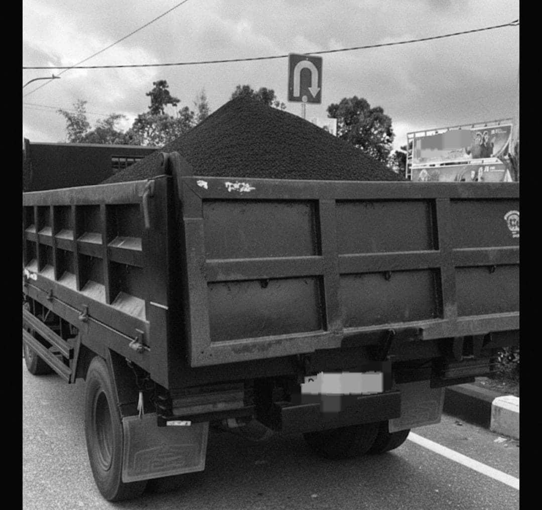 Ilustrasi berita Mimika: Ganggu Pengguna Jalan Lain, Warga Timika Desak Penertiban Truk Material Tanpa Penutup Terpal