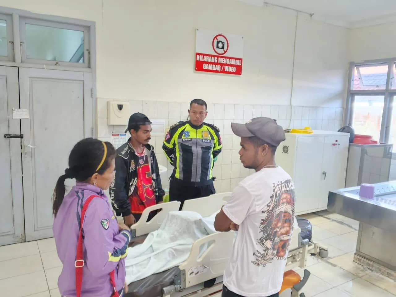 Korban saat berada di kamar jenazah RSUD Mimika.