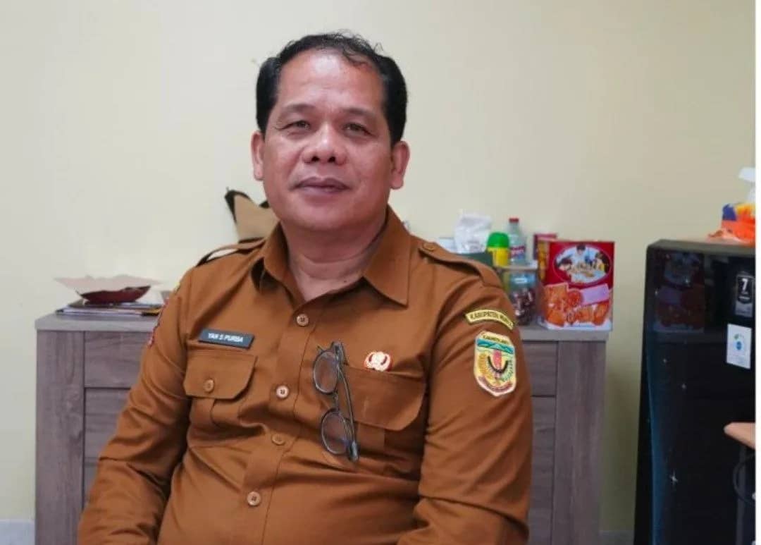 Yan Slamat Purba.