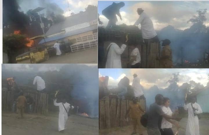 Tampak dua orang orang imam Katolik berusaha menyelamatkan petugas Airnav yang terjebak