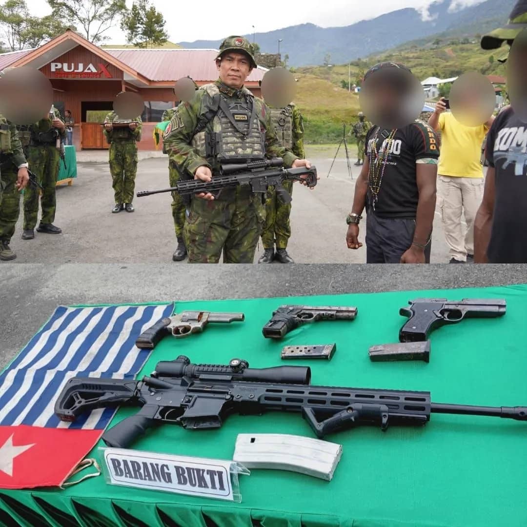 Pangkoops TNI Habema Brigjen TNI Riyanto saat menerima empat pucuk senjata dalam Upacara Reintegrasi Nasional di halaman Makodim 1714/Puncak Jaya, Sabtu (26/9).