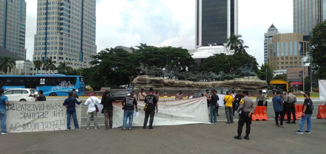 Ilustrasi berita Nasional: Karyawan Mogok Kerja Freeport Demo di Patung Kuda, Menolak Lupa Janji Presiden