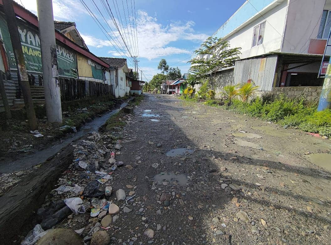 Ilustrasi berita Mimika: Aneh, Dua Ruas Jalan Lingkungan Dalam Kota Timika Ini Ditolak Warga Untuk Diaspal