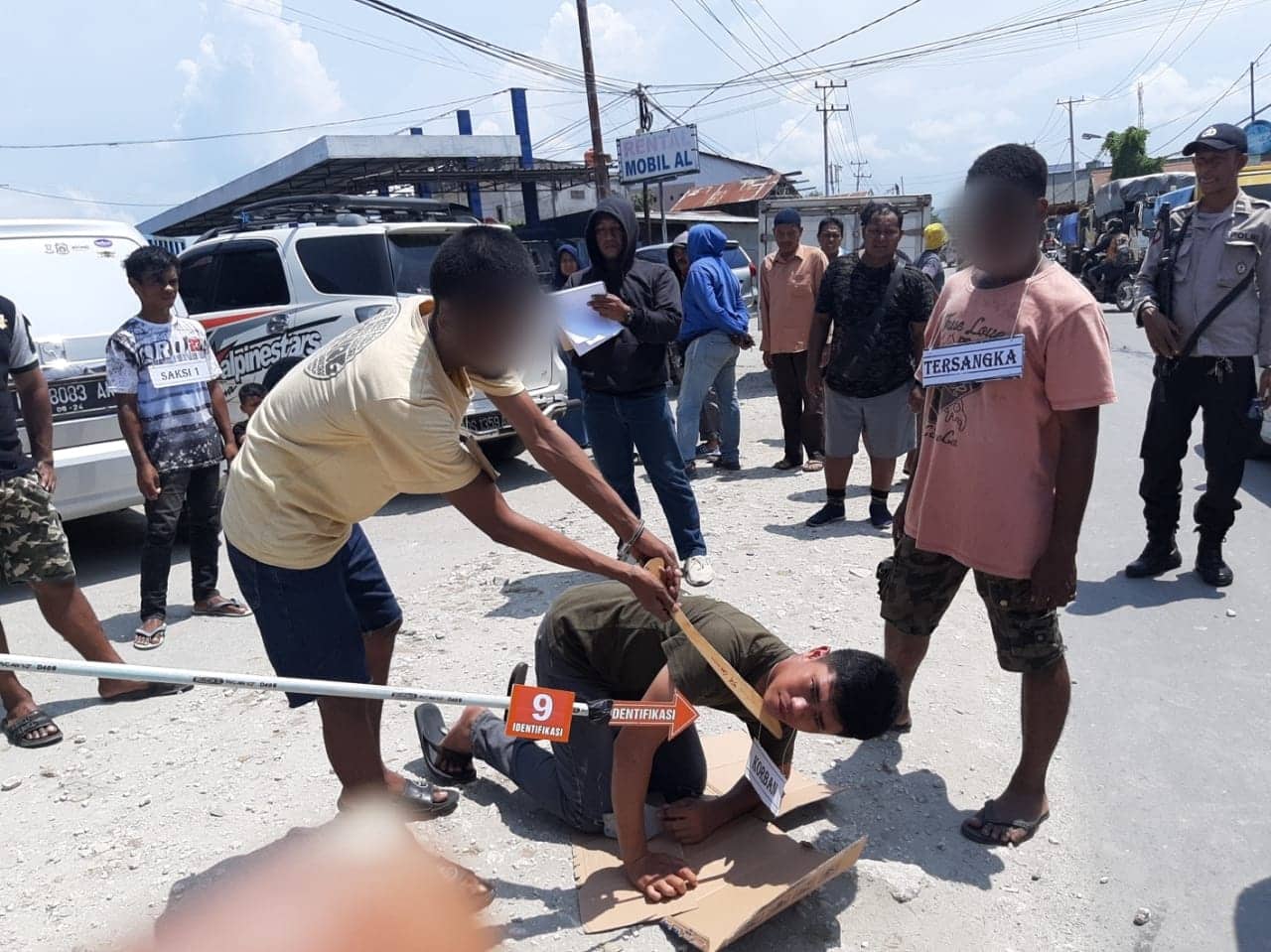Ilustrasi berita Papua: Reka Ulang Pembunuhan di Jalan Masuk Pantai Hamadi, Tersangka Peragakan 9 Adegan