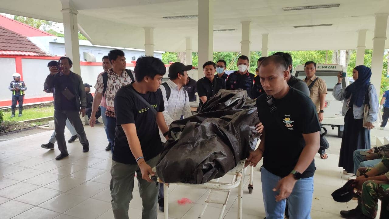 Ilustrasi berita Papua: Karyawan Bank Papua yang Tewas Ditembak OTK Ternyata Sedang Membeli Nasi Kuning di Warung, Jazad Korban Tiba di RSUD Mimika