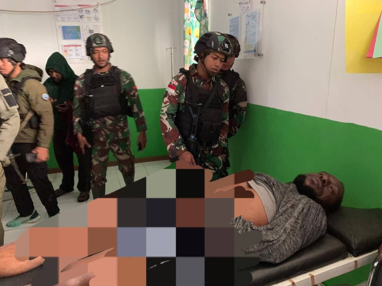 Ilustrasi berita Mimika: Flashnews : Pegawai Bank Papua Tewas Ditembak Orang Tak Dikenal