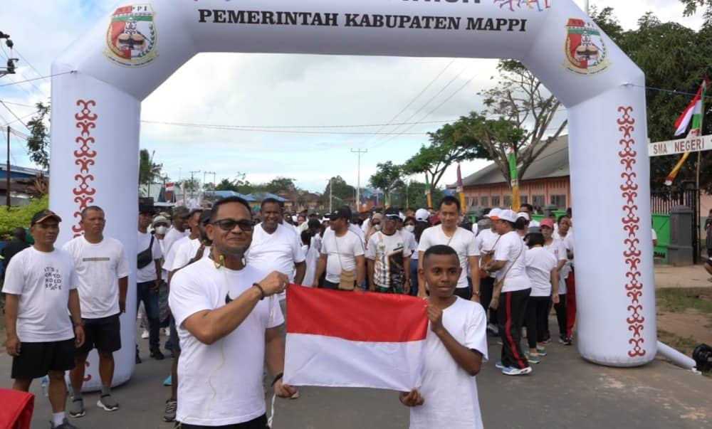Ilustrasi berita Papua: Sambut HUT RI ke-78, Penjabat Bupati Mappi Bagikan 5.000 Bendera Merah Putih dan Ikuti Colour Run