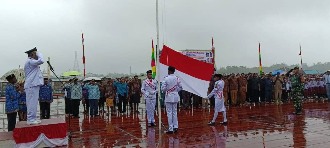Ilustrasi berita Mimika: Diguyur Hujan, Distrik Mimika Timur Jauh Gelar Upacara HUT RI ke-79 Dengan Hikmat