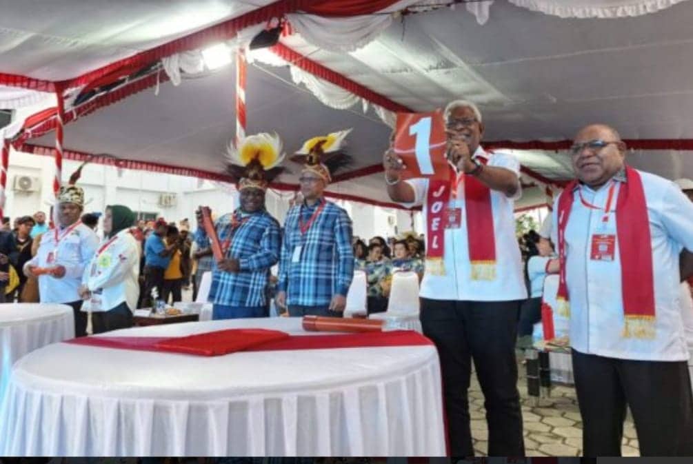 Ilustrasi berita Mimika: Jelang Debat Pilkada Mimika : Adu Gagasan, Menakar Kapasitas Kandidat, Mengabaikan Isi Tas