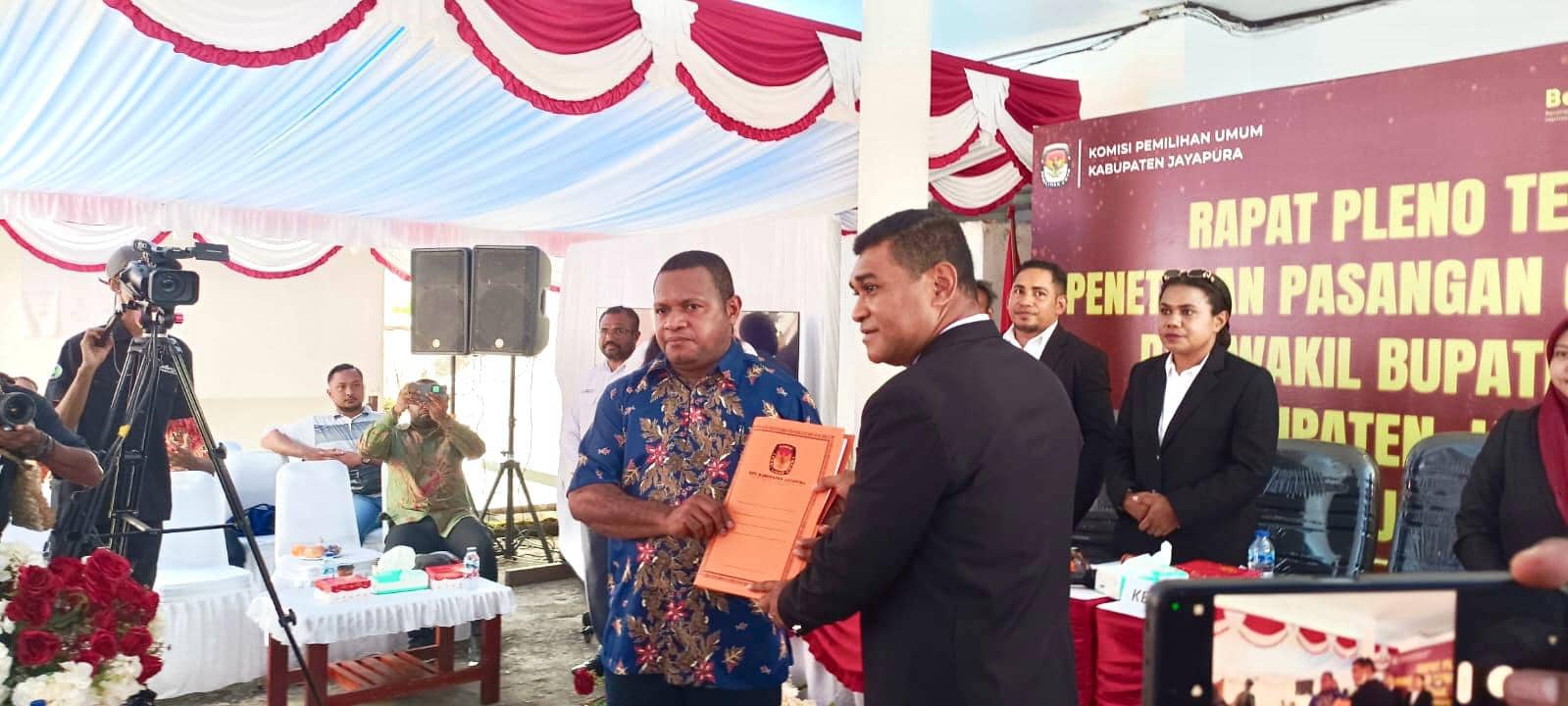 Ilustrasi berita JAYAPURA: Rapat Pleno Terbuka, KPU Tetapkan Yunus Wonda-Haris Richard Yocku Bupati dan Wabup Jayapura Terpilih