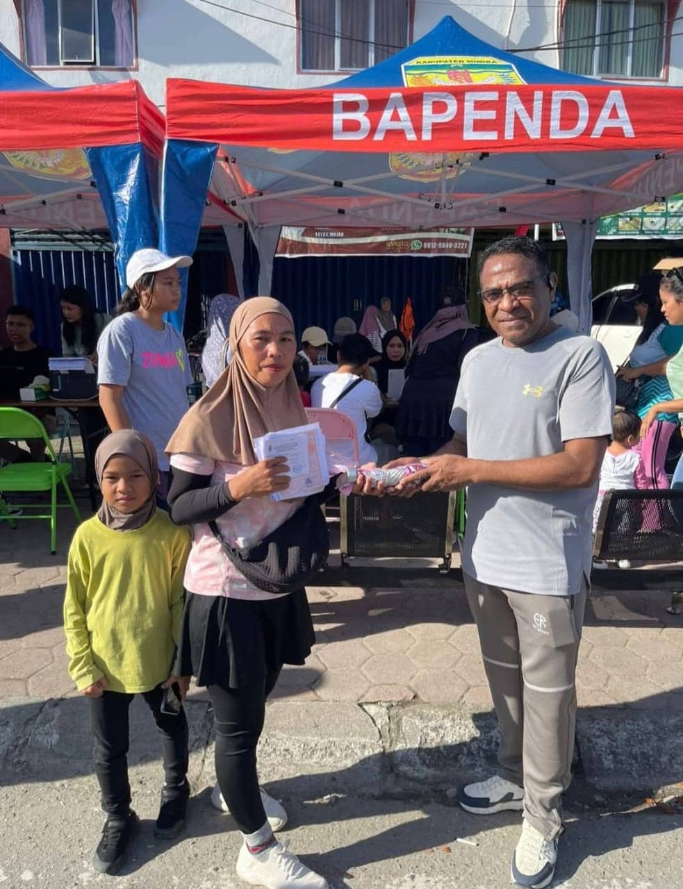 Ilustrasi berita Mimika: Bapenda Mimika Buka Pelayanan Pajak di Car Free Day, Warga Antusias Manfaatkan Penghapusan Denda