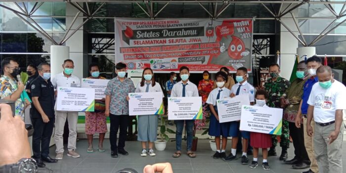 Ahli waris penerima santunan dan beasiswa dari BPJS Tenaga Kerja